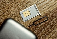 Insert sim card into smartphone.