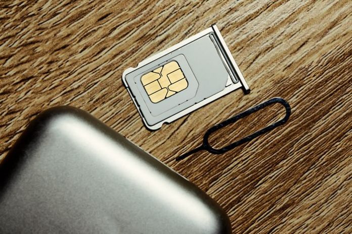 Insert sim card into smartphone.